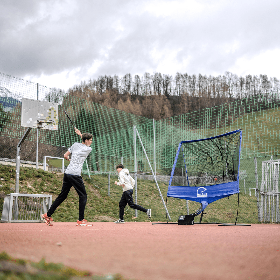 Fast Track Tennis rebounder net with ball machine